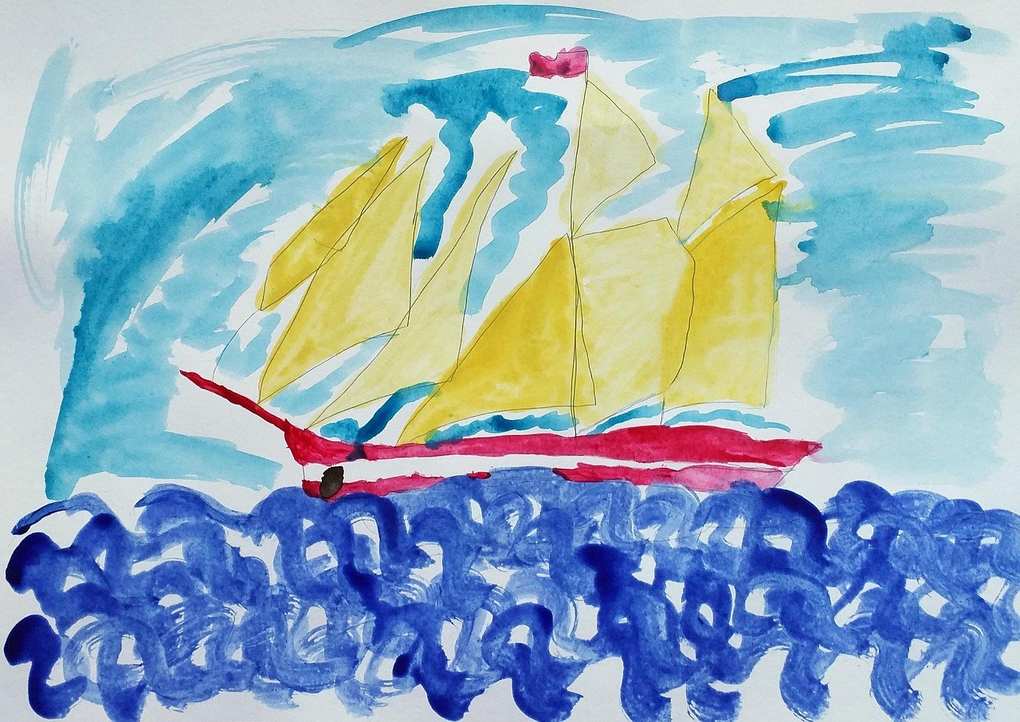 Bateau à voiles rouges et jaunes sur mer bleue, ciel aqua, drapeau rouge au sommet Bateau à voiles rouges et jaunes sur mer bleue, ciel aqua, drapeau rouge au sommet